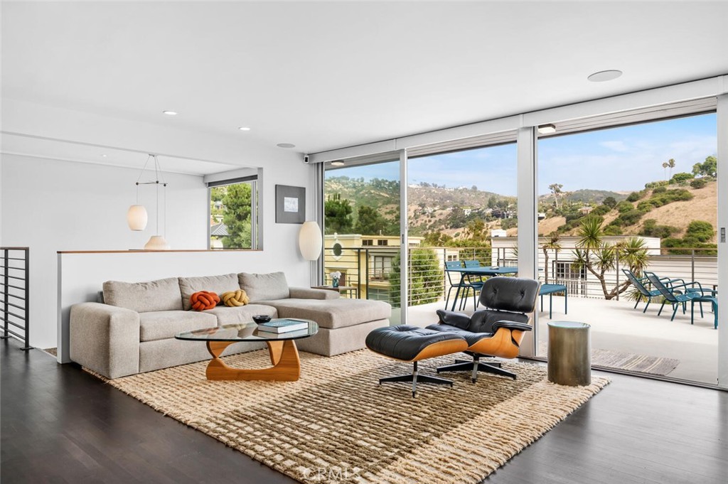 1340 Cerritos Drive Laguna Beach, CA 92651 - Photo 2 of 46 a living room with furniture and a large window