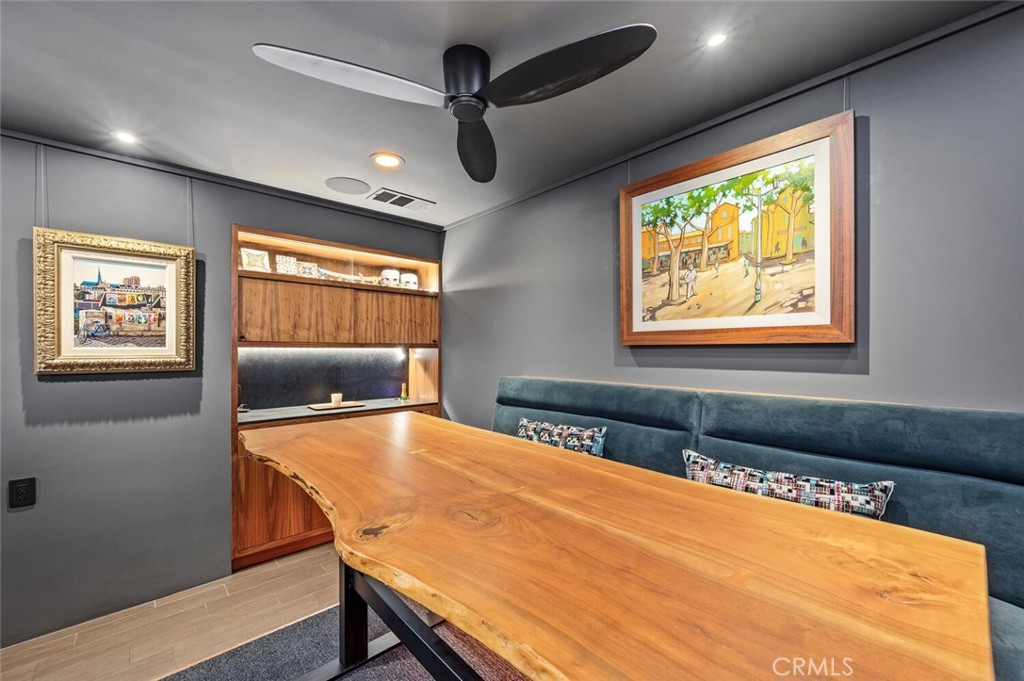 1340 Cerritos Drive Laguna Beach, CA 92651 - Photo 29 of 46 a living room with stainless steel appliances kitchen island granite countertop furniture and a large window