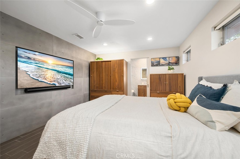 1340 Cerritos Drive Laguna Beach, CA 92651 - Photo 32 of 46 a bedroom with a bed and cupboard