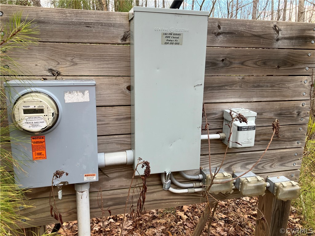 5 Crystal Lake Road Crewe, VA 23930 - Photo 2 of 4 a front view of a house with wooden floor