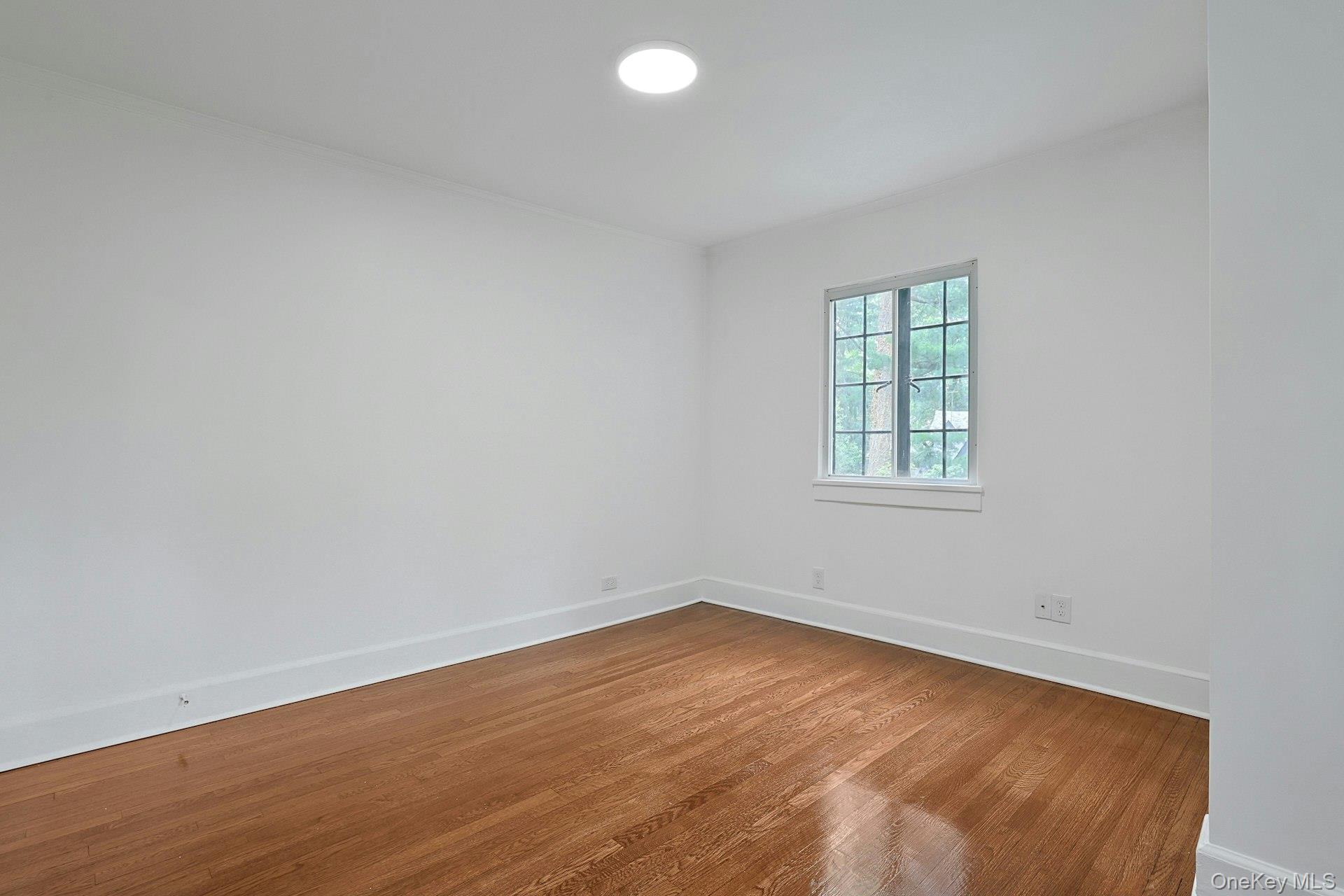 14 Withington Road Scarsdale, NY 10583 - Photo 25 of 41 an empty room with a window