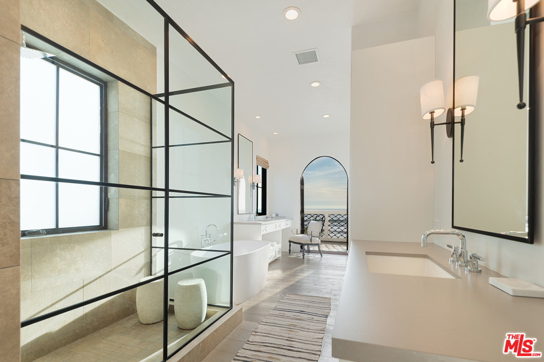 30826 Broad Beach Road Malibu, CA 90265 - Photo 14 of 23 a bathroom with a sink and a mirror