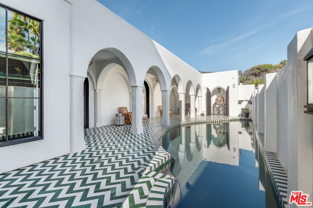 30826 Broad Beach Road Malibu, CA 90265 - Photo 5 of 23 a view of a bedroom with furniture