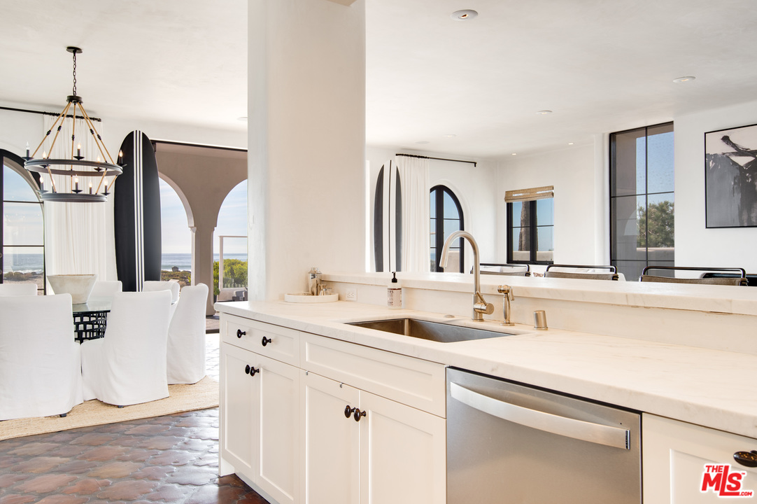 30826 Broad Beach Road Malibu, CA 90265 - Photo 9 of 23 a bathroom with a double vanity sink and mirror