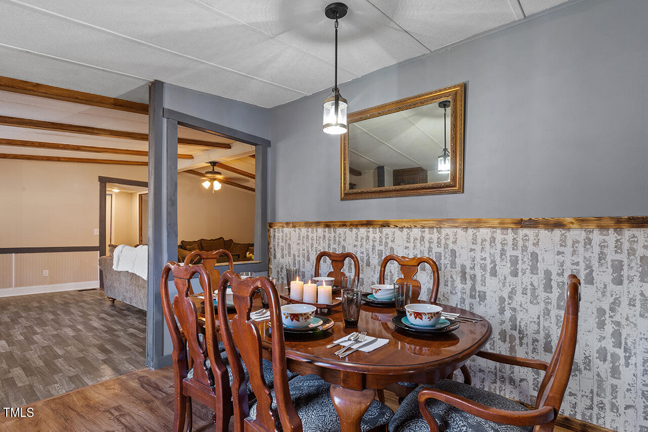 4320 Mitchell Mill Road Wake Forest, NC 27587 - Photo 8 of 24 a dining room with furniture and window