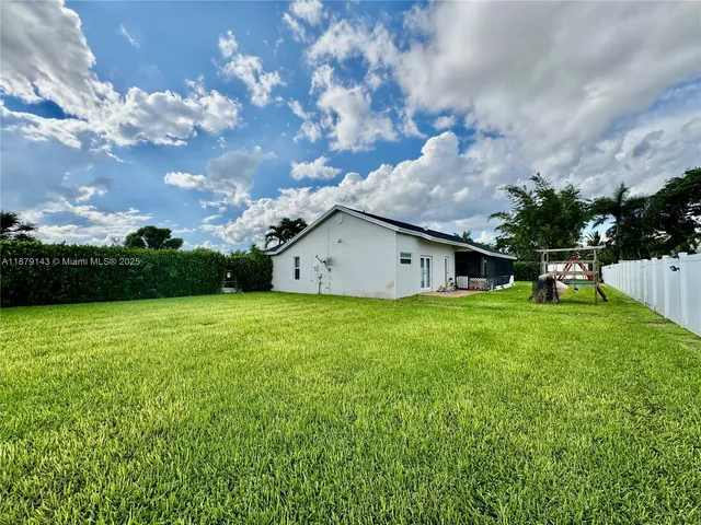 a house view with a garden space