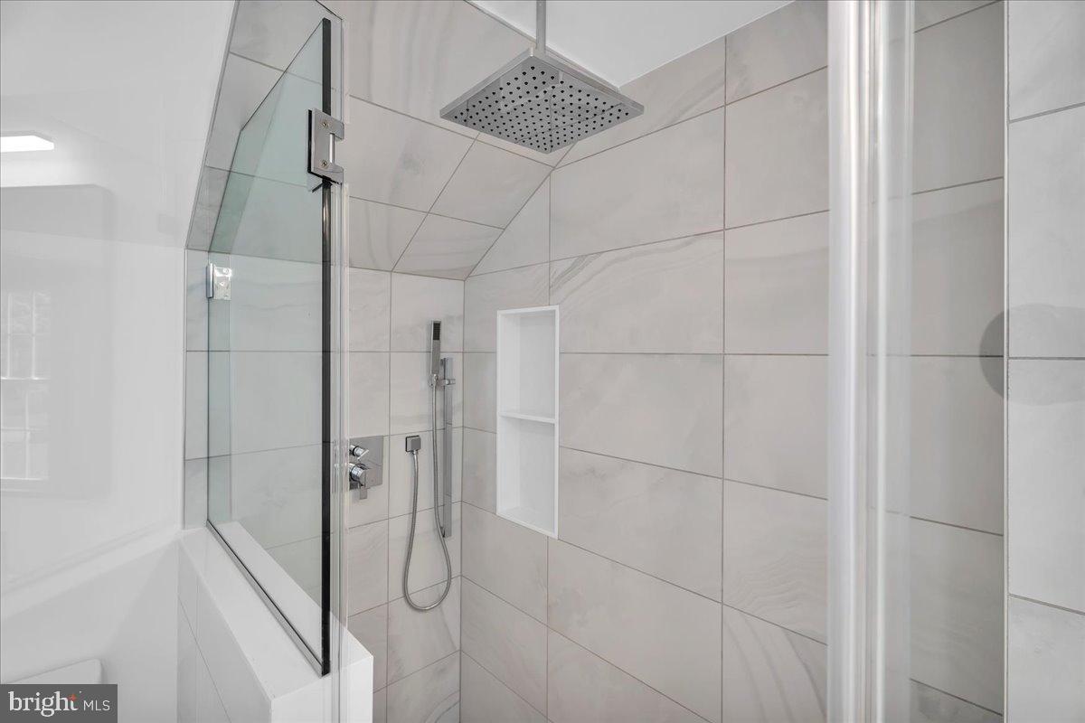16 Doncaster Road Cherry Hill, NJ 08003 - Photo 25 of 43 Sleek modern shower with elegant tiles.