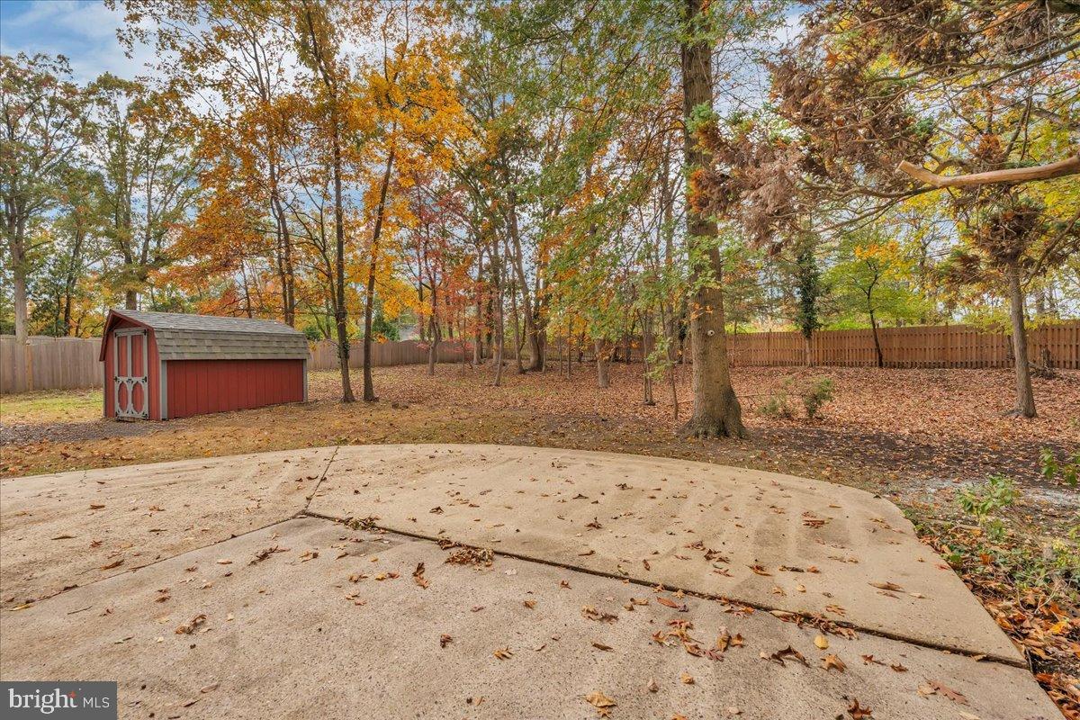 16 Doncaster Road Cherry Hill, NJ 08003 - Photo 35 of 43 Serene autumn retreat with vibrant foliage.