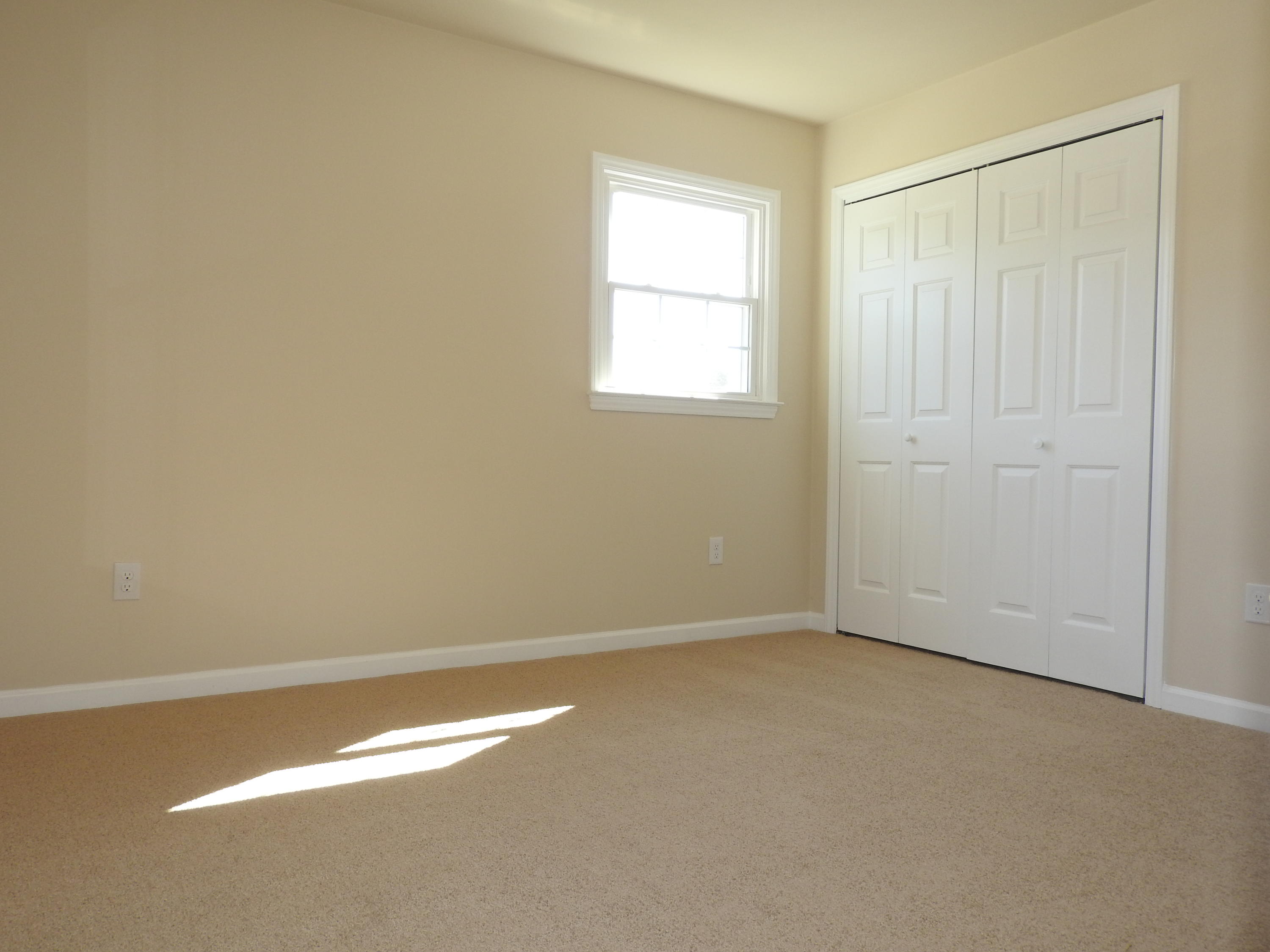 1873 Morgans Mill Road Goodview, VA 24095 - Photo 11 of 26 an empty room with a window