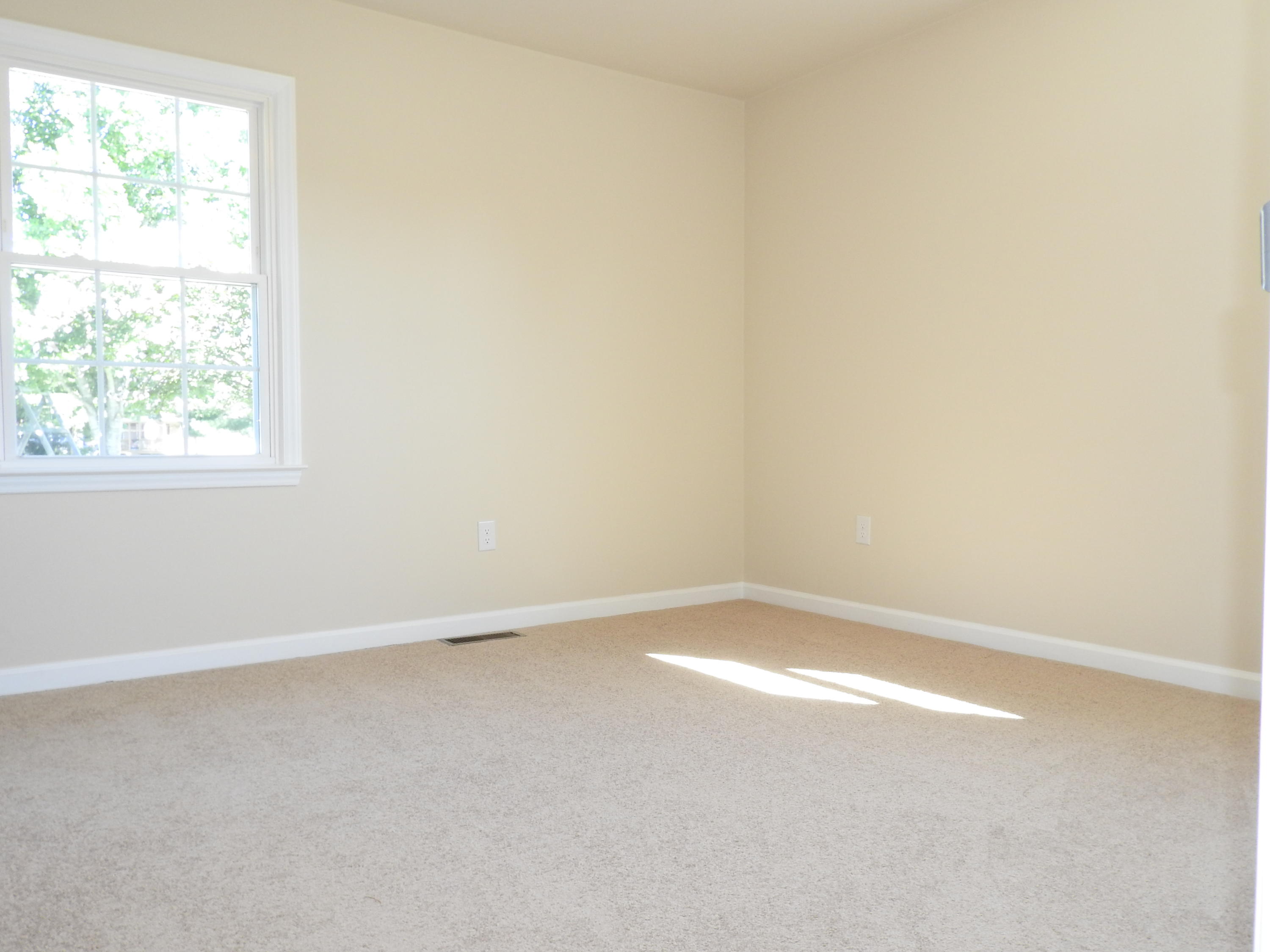 1873 Morgans Mill Road Goodview, VA 24095 - Photo 13 of 26 an empty room with a window