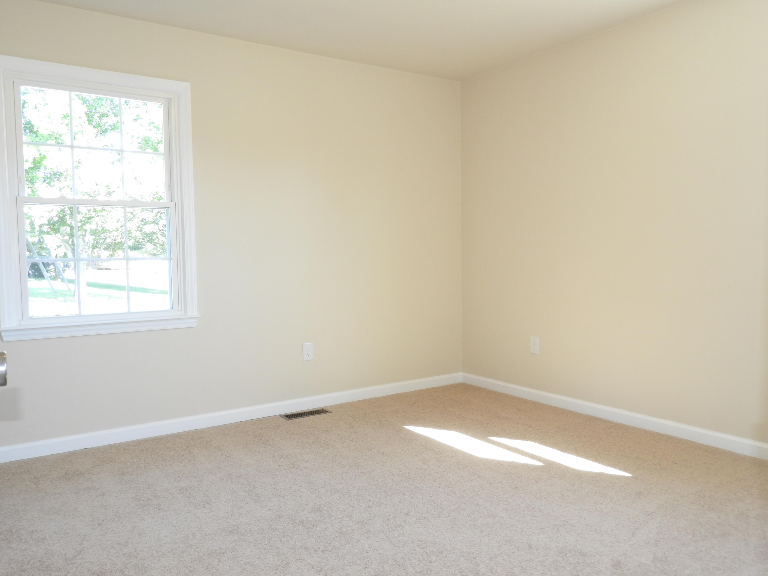 1873 Morgans Mill Road Goodview, VA 24095 - Photo 15 of 26 an empty room with a window