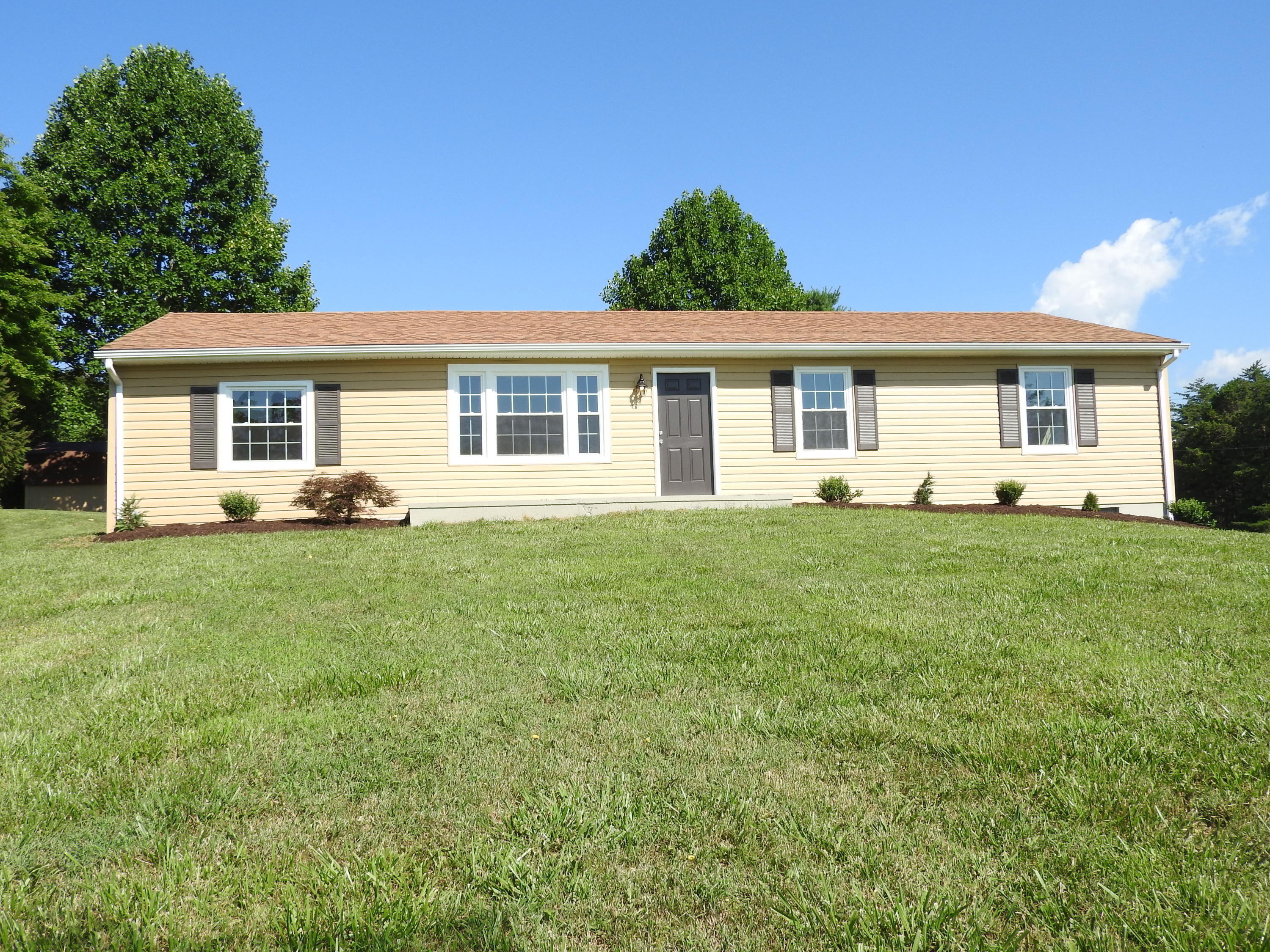 1873 Morgans Mill Road Goodview, VA 24095 - Photo 26 of 26 a front view of house with yard and green space