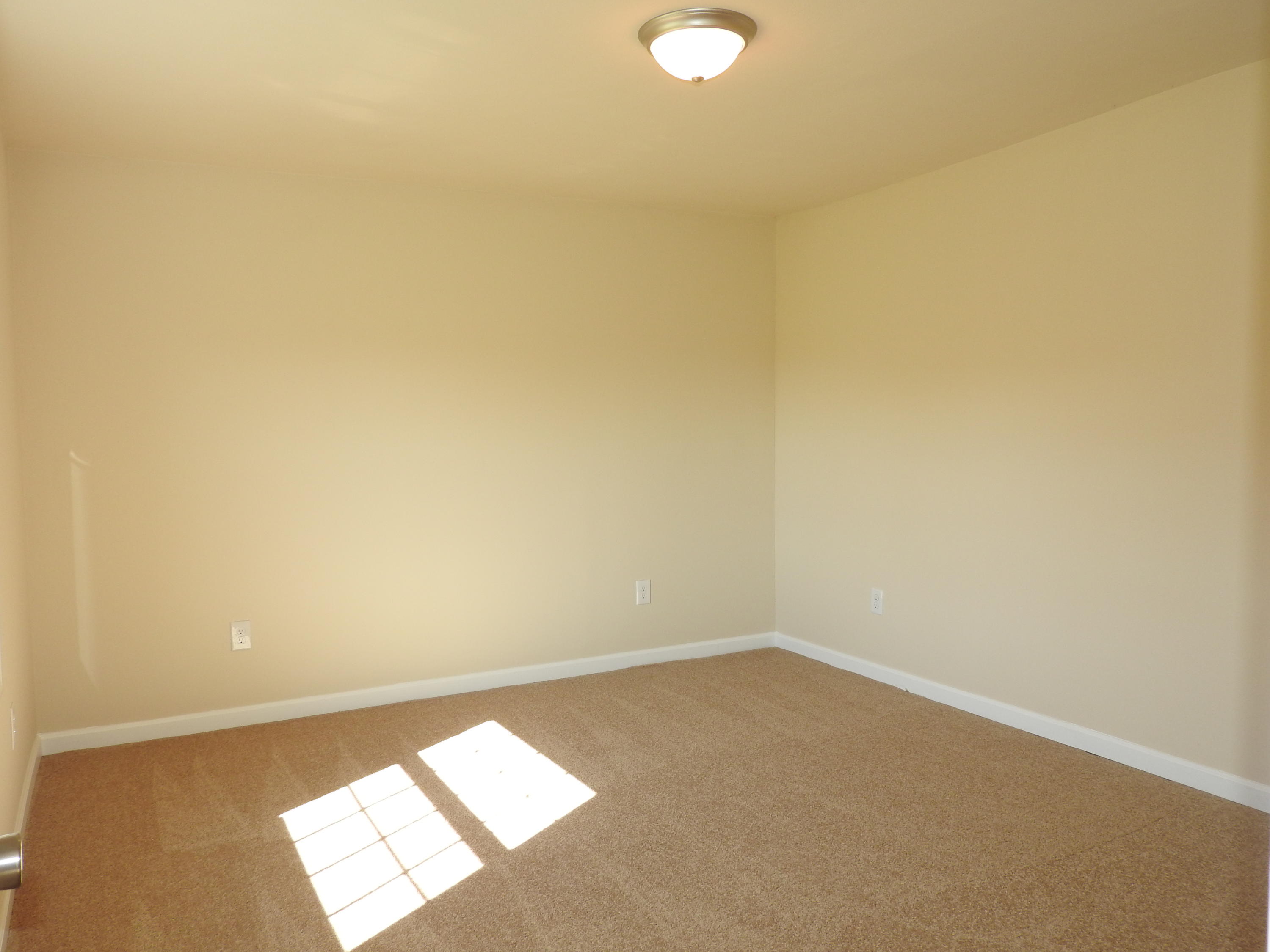 1873 Morgans Mill Road Goodview, VA 24095 - Photo 9 of 26 a view of an empty room and window