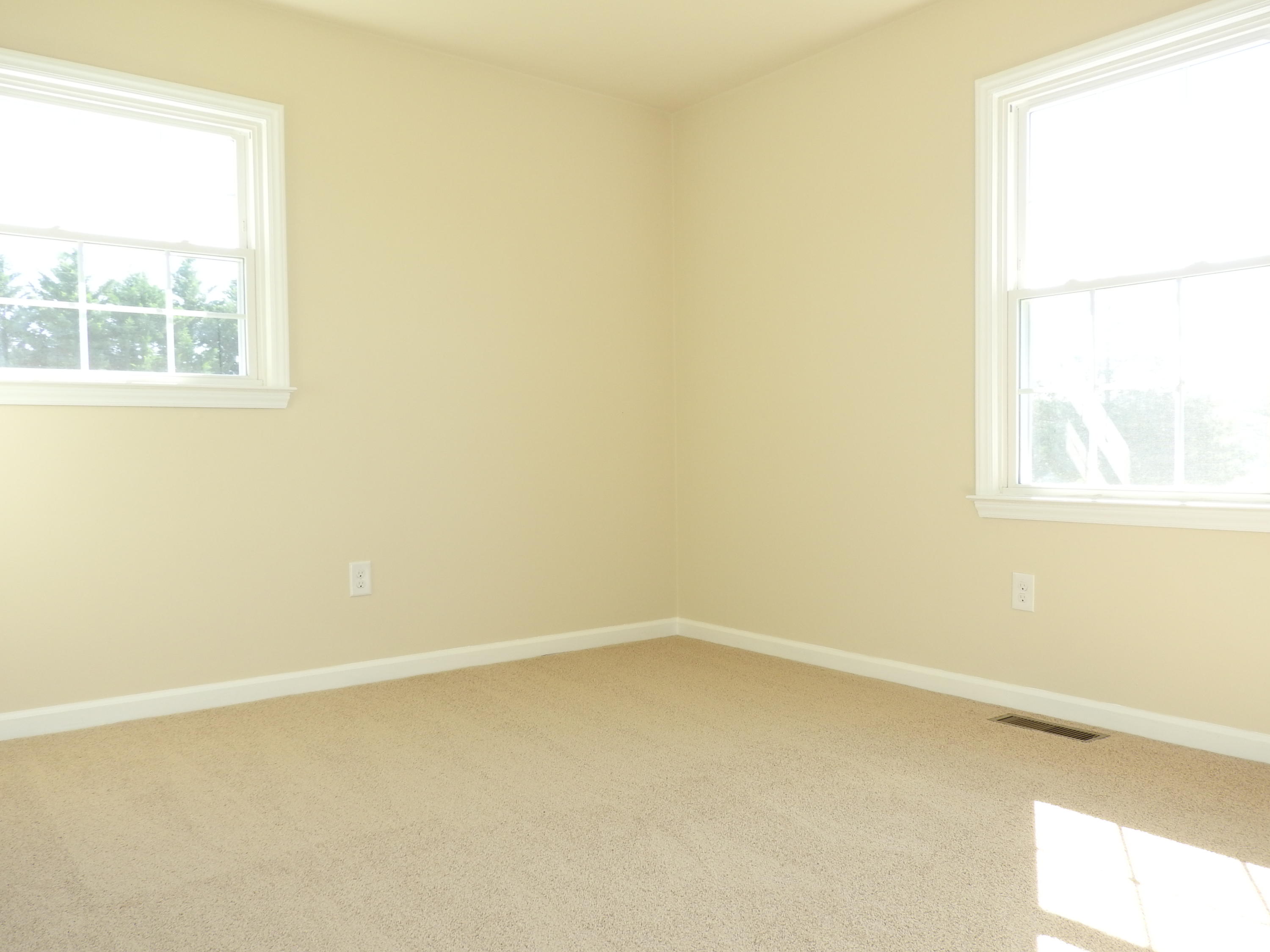1873 Morgans Mill Road Goodview, VA 24095 - Photo 10 of 26 an empty room with a window