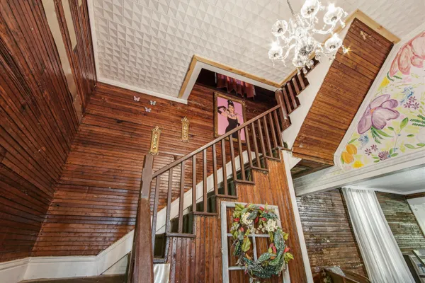 a view of entryway with a front door