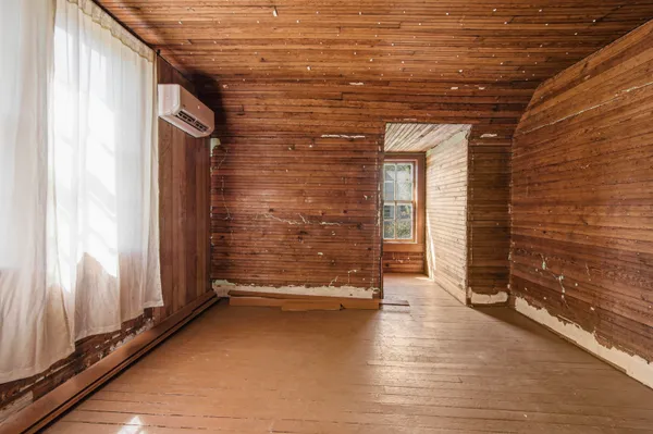 a view of outdoor space with wooden floor