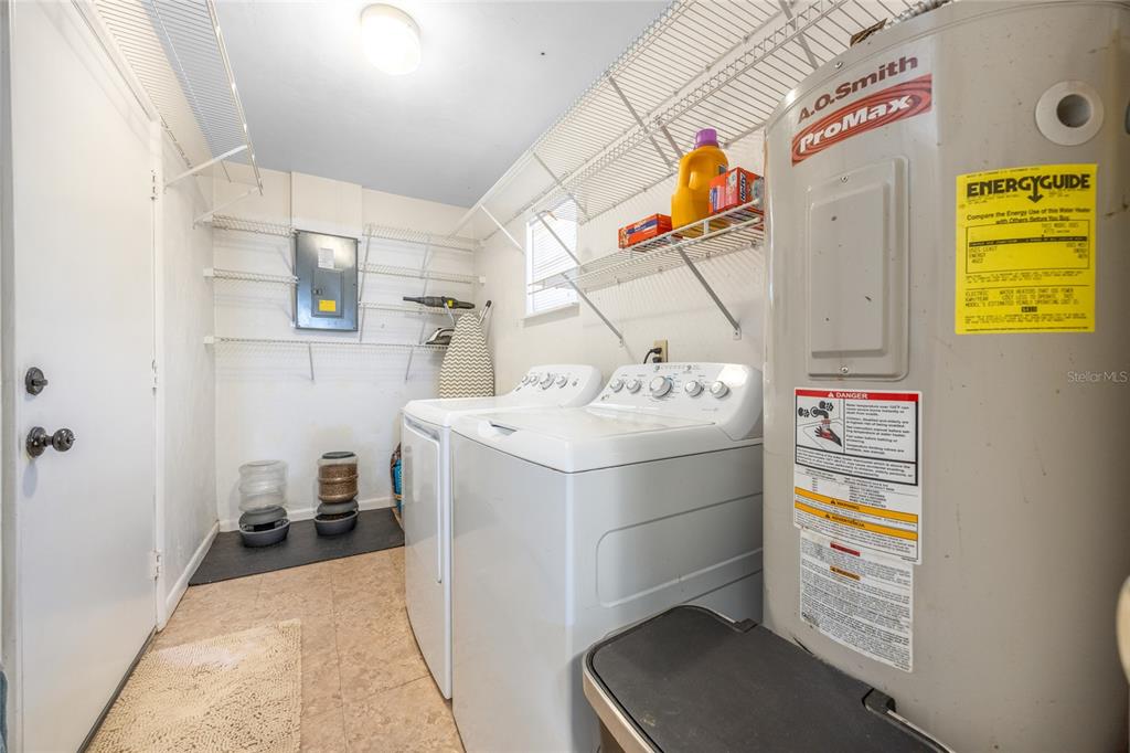 545 Southwest 257 Terrace Newberry, FL 32669 - Photo 30 of 46 a utility room with dryer and washer