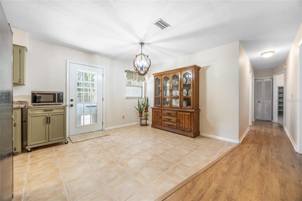 545 Southwest 257 Terrace Newberry, FL 32669 - Photo 9 of 46 a view of a kitchen with refrigerator and dishwasher