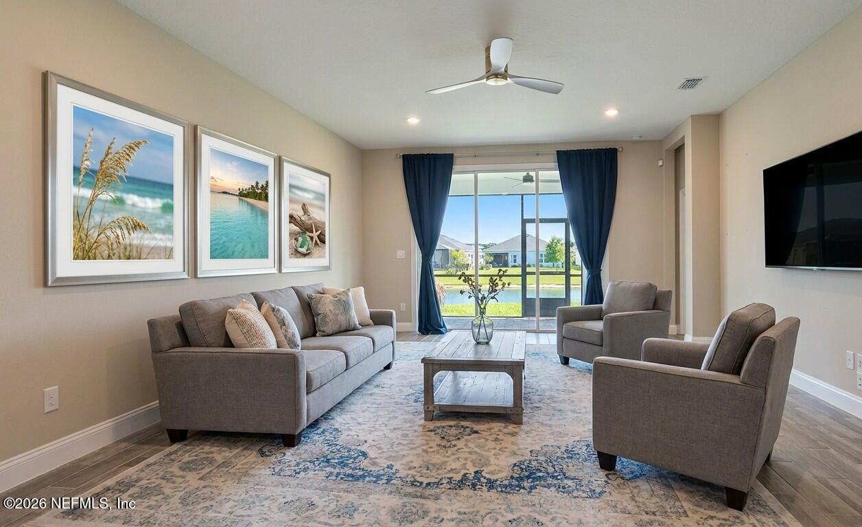 378 Varner Way St. Augustine, FL 32092 - Photo 4 of 8 a living room with furniture and a large window