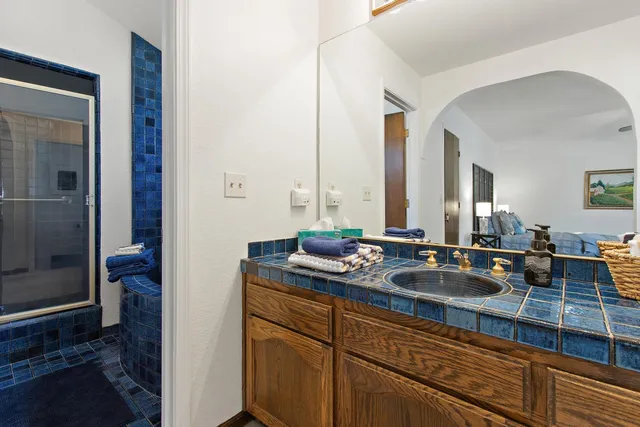 a view of bathroom with dual sinks