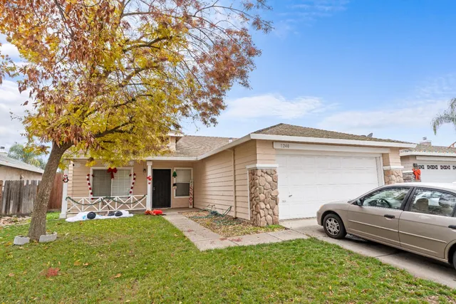 a car parked in front of a house