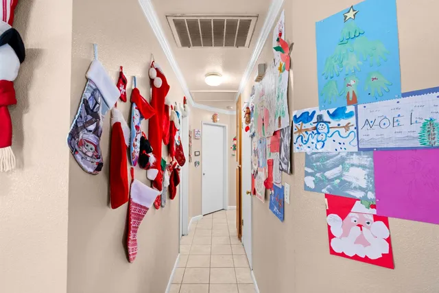 a view of a entryway door with hallway