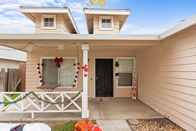a front view of a house with garage