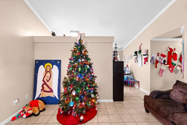 a kitchen with stainless steel appliances granite countertop a refrigerator and a stove