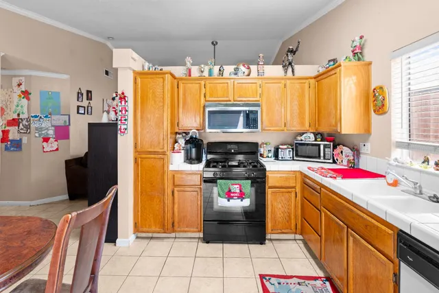 a very nice looking dining room with a table and chairs in it