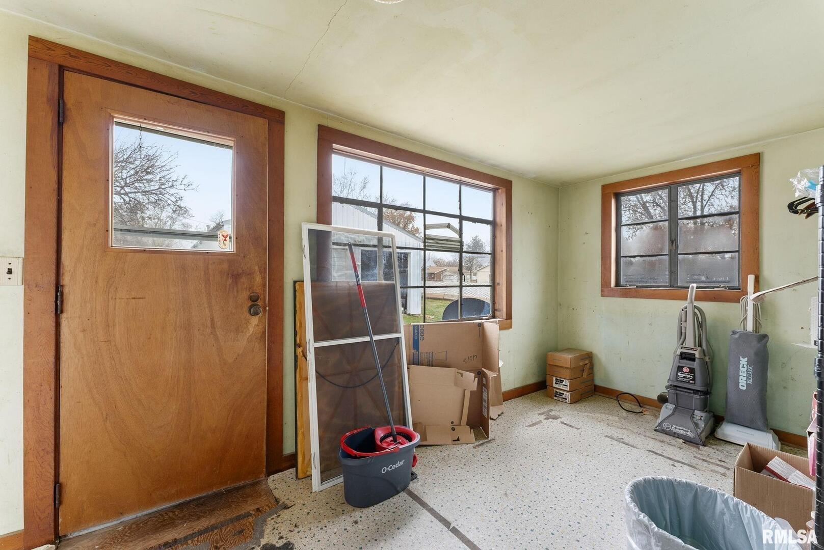 315 West Locust Street Cambridge, IL 61238 - Photo 9 of 27 a bedroom with furniture and a window