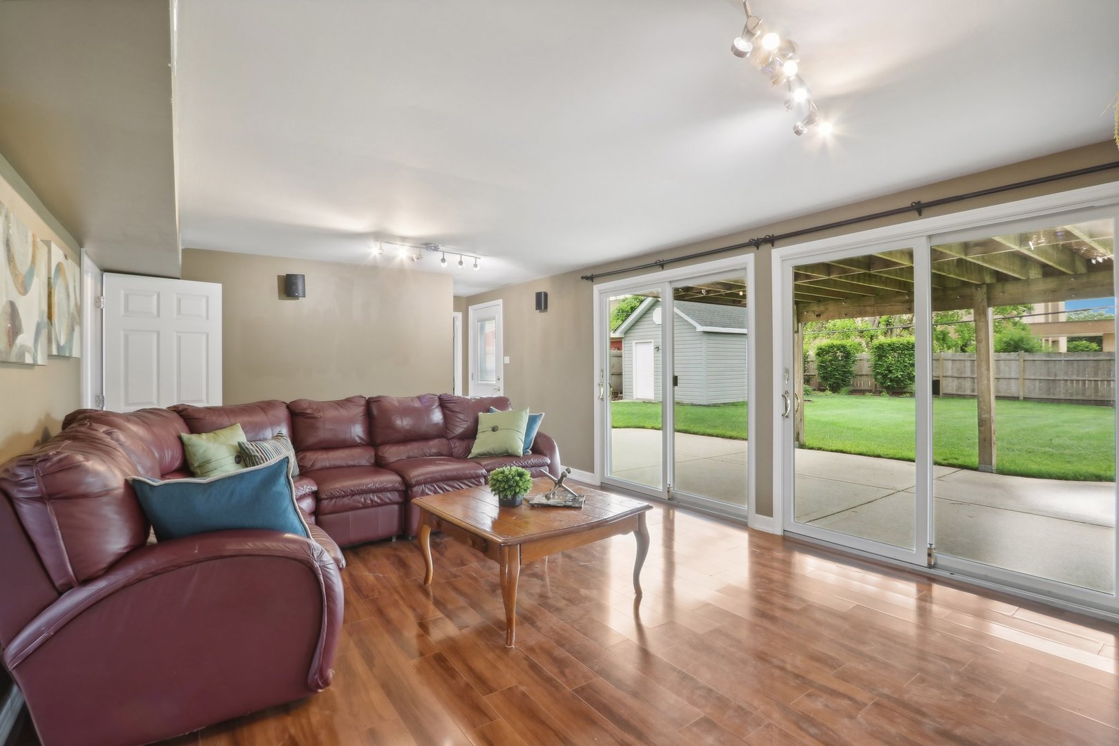 785 Cambridge Lane Hoffman Estates, IL 60169 - Photo 11 of 48 a living room with furniture and a floor to ceiling window