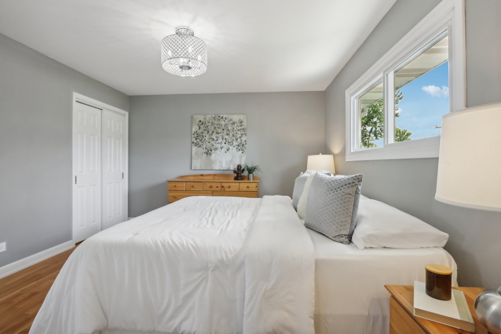 785 Cambridge Lane Hoffman Estates, IL 60169 - Photo 19 of 48 a bedroom with a bed and a window