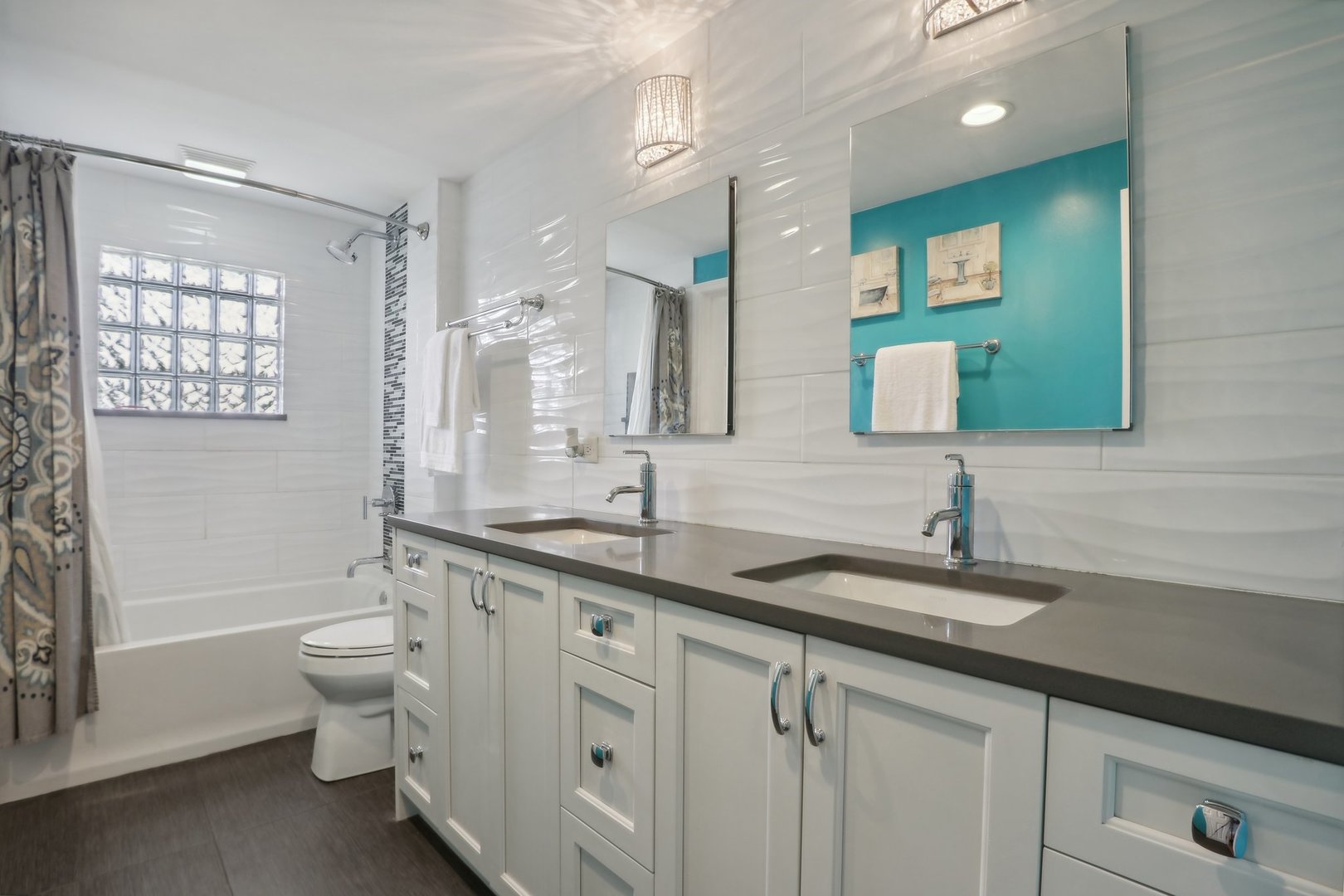 785 Cambridge Lane Hoffman Estates, IL 60169 - Photo 21 of 48 a bathroom with a double vanity sink toilet and a mirror