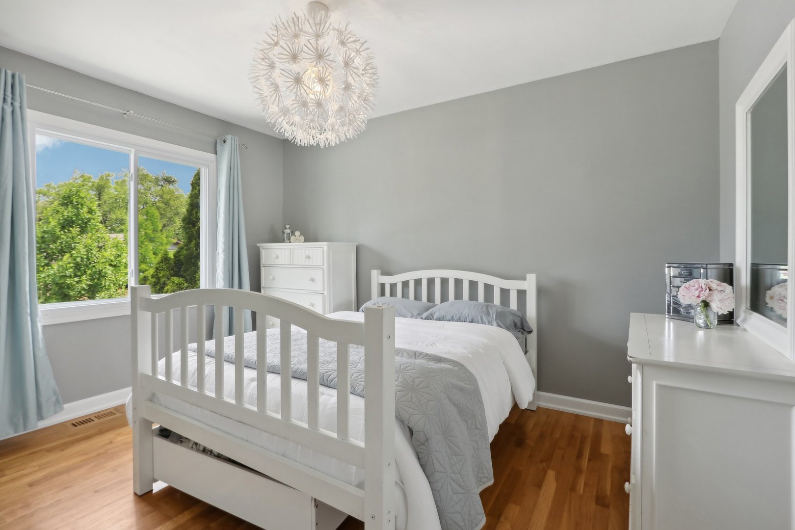 785 Cambridge Lane Hoffman Estates, IL 60169 - Photo 23 of 48 a bedroom with a bed and a table