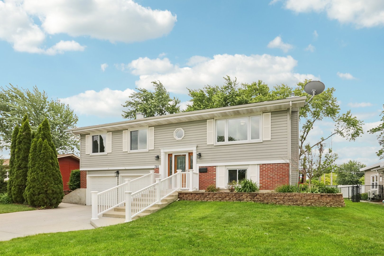 785 Cambridge Lane Hoffman Estates, IL 60169 - Photo 3 of 48 a view of house with a yard