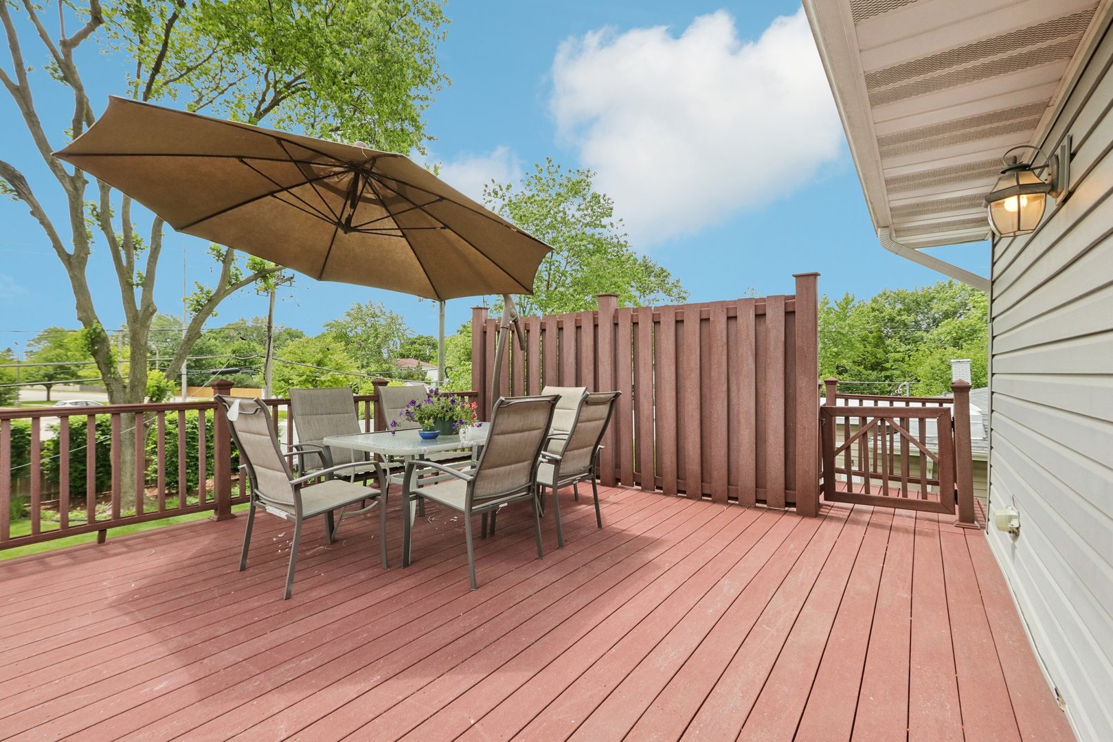 785 Cambridge Lane Hoffman Estates, IL 60169 - Photo 31 of 48 a view of balcony with outdoor seating and wooden floor
