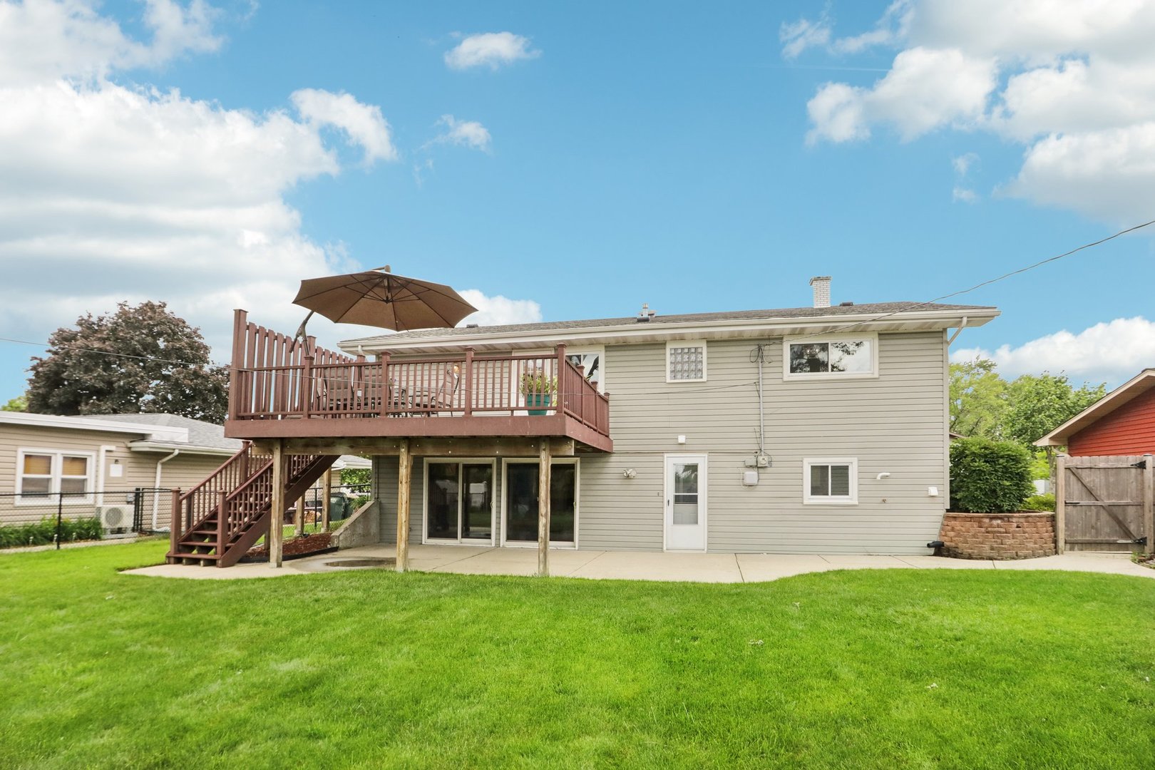 785 Cambridge Lane Hoffman Estates, IL 60169 - Photo 34 of 48 a view of a house with a yard