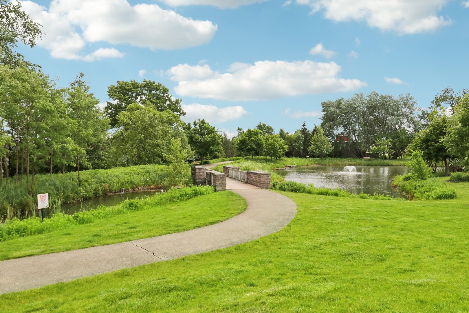 785 Cambridge Lane Hoffman Estates, IL 60169 - Photo 47 of 48 a view of a lake with a big yard