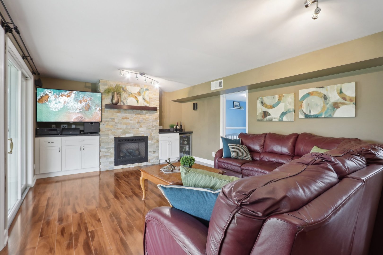785 Cambridge Lane Hoffman Estates, IL 60169 - Photo 8 of 48 a living room with furniture and a fireplace