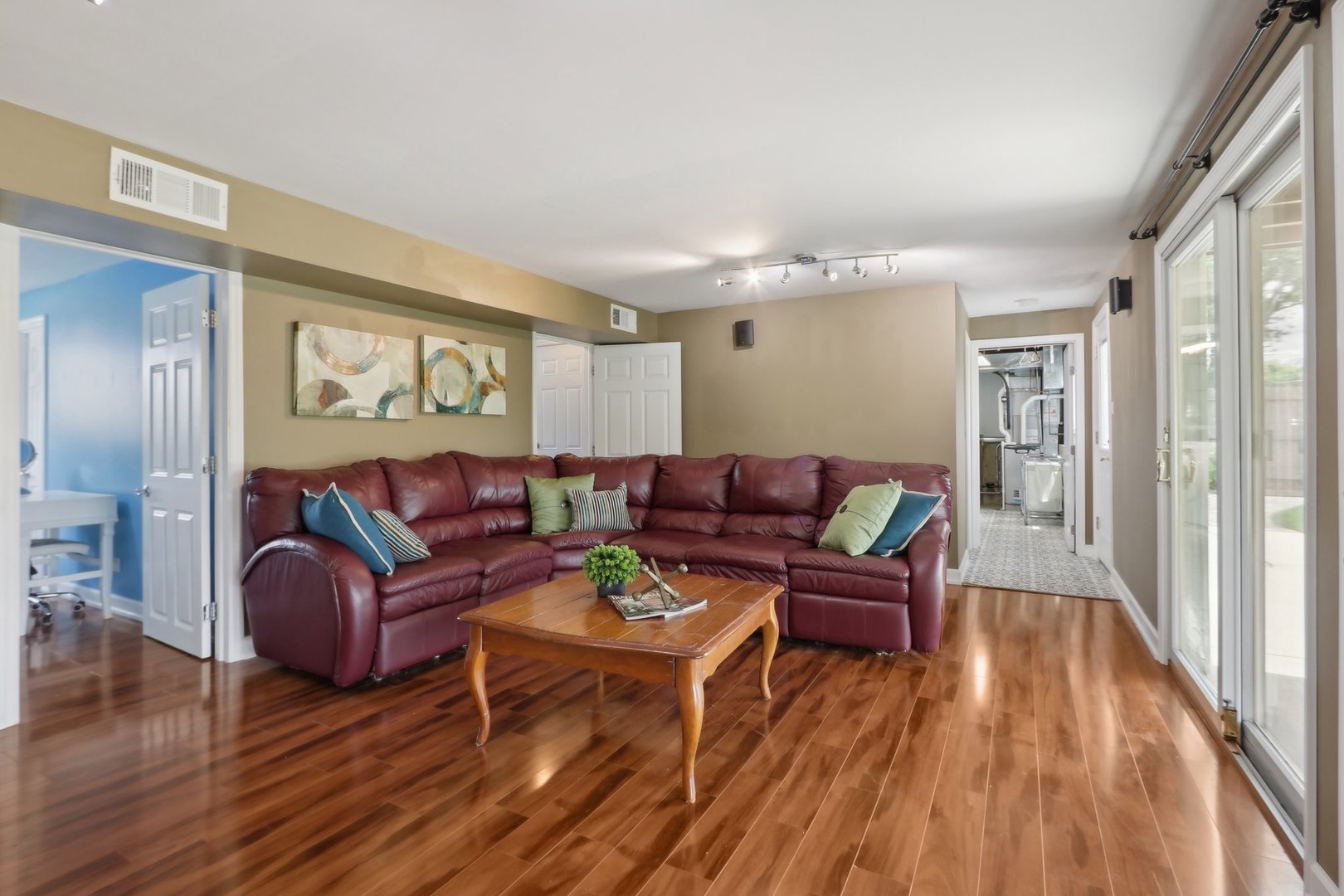 785 Cambridge Lane Hoffman Estates, IL 60169 - Photo 9 of 48 a living room with furniture and a wooden floor