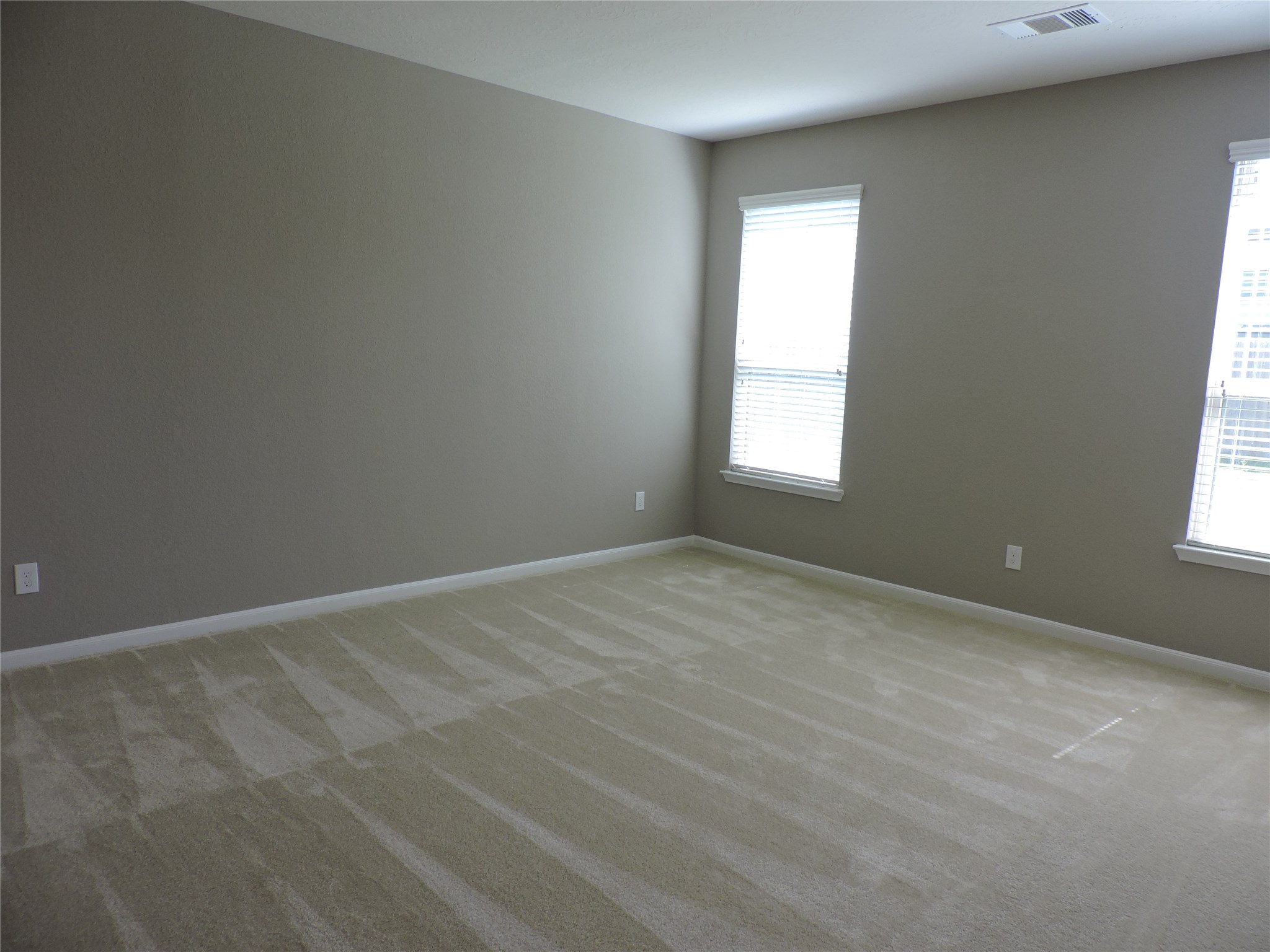 1102 Upton Court Conroe, TX 77304 - Photo 11 of 30 an empty room with a window