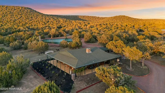 an aerial view of residential house with outdoor space