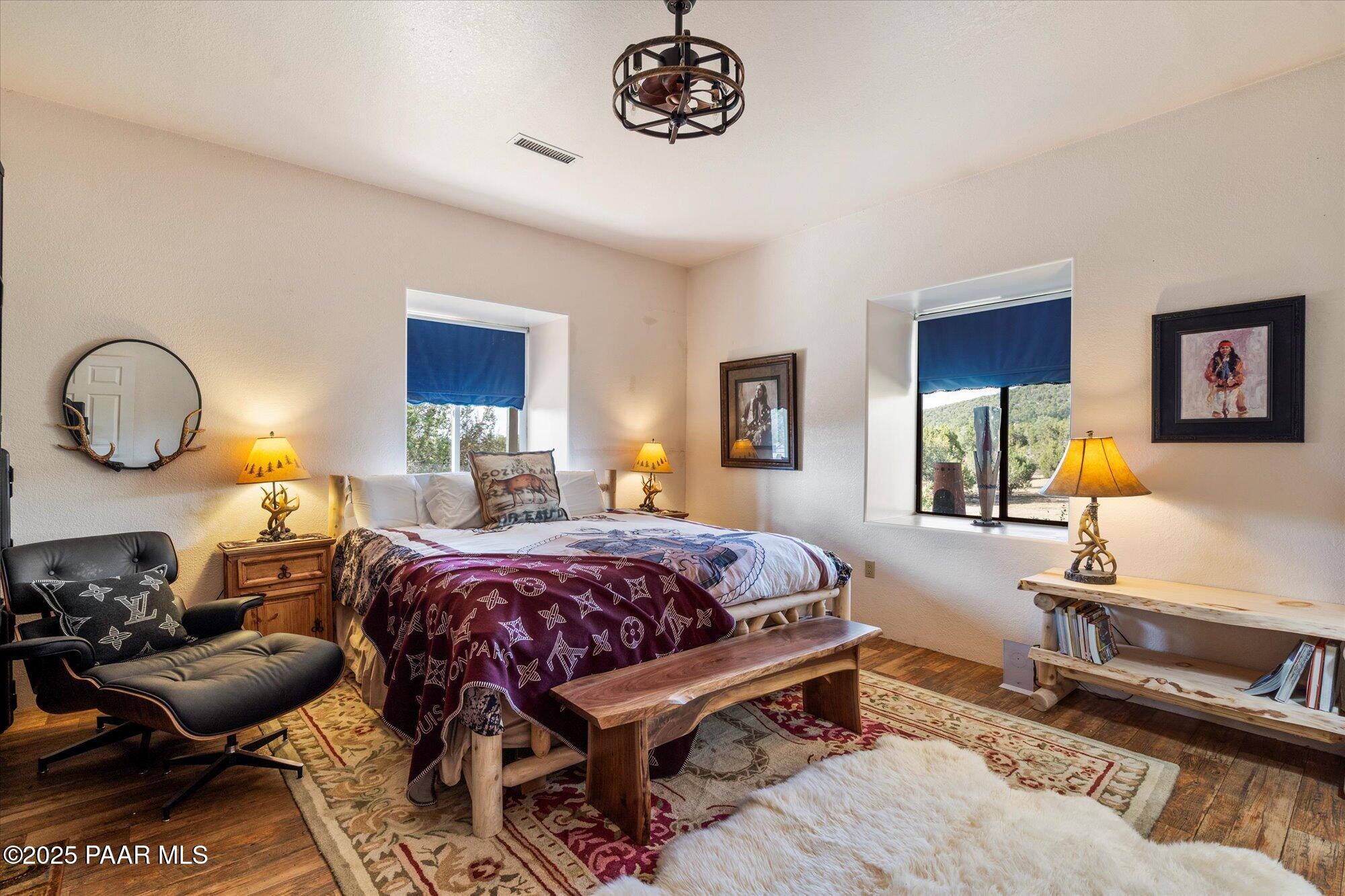 33425 Cowboy Clint Road Seligman, AZ 86337 - Photo 33 of 79 a bedroom with bed and a couch