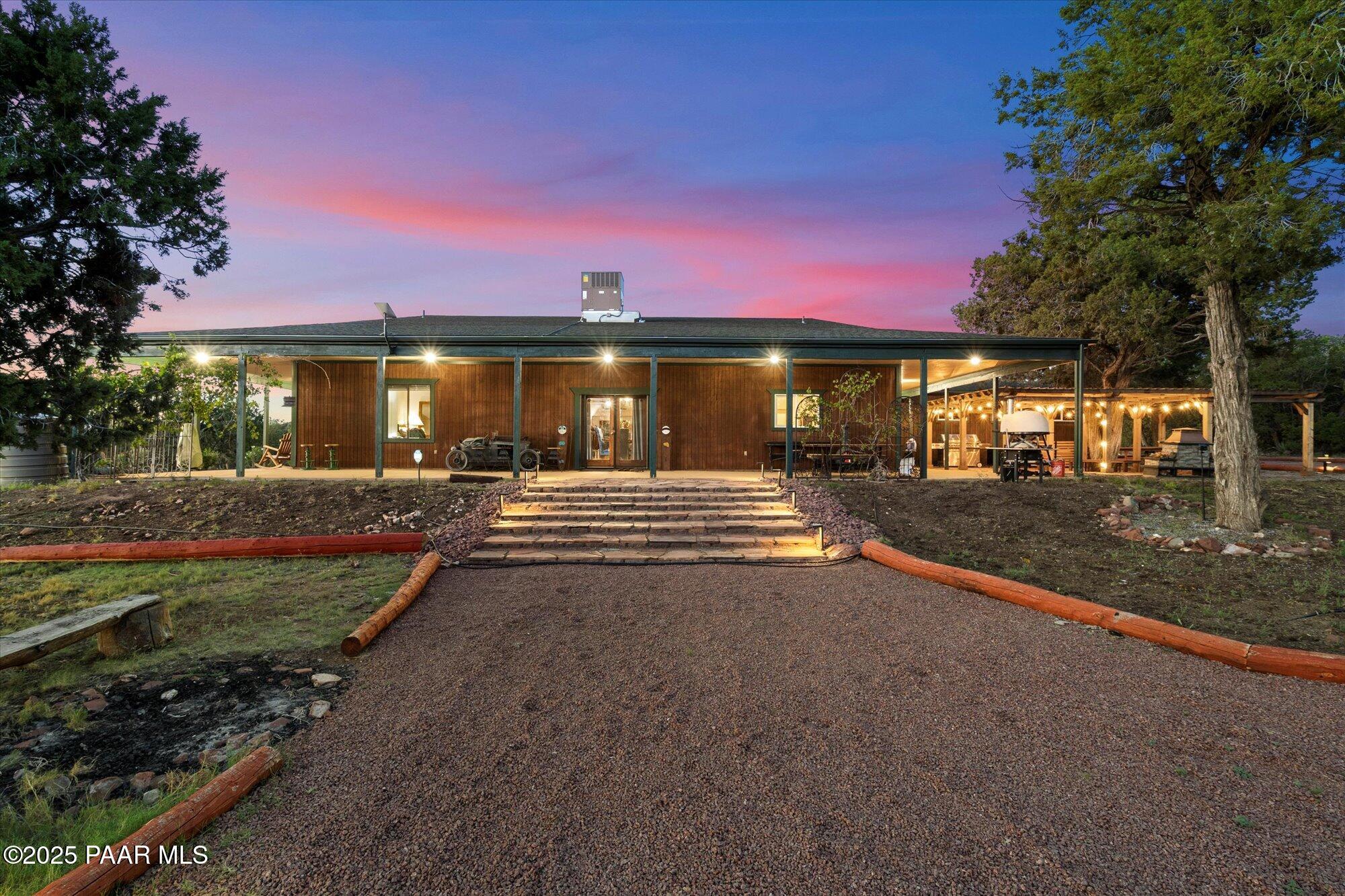 33425 Cowboy Clint Road Seligman, AZ 86337 - Photo 8 of 79 a front view of a house with a yard