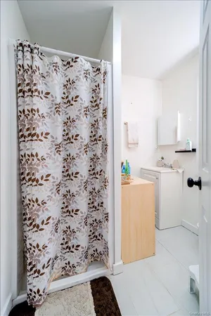 a kitchen with a refrigerator and a stove