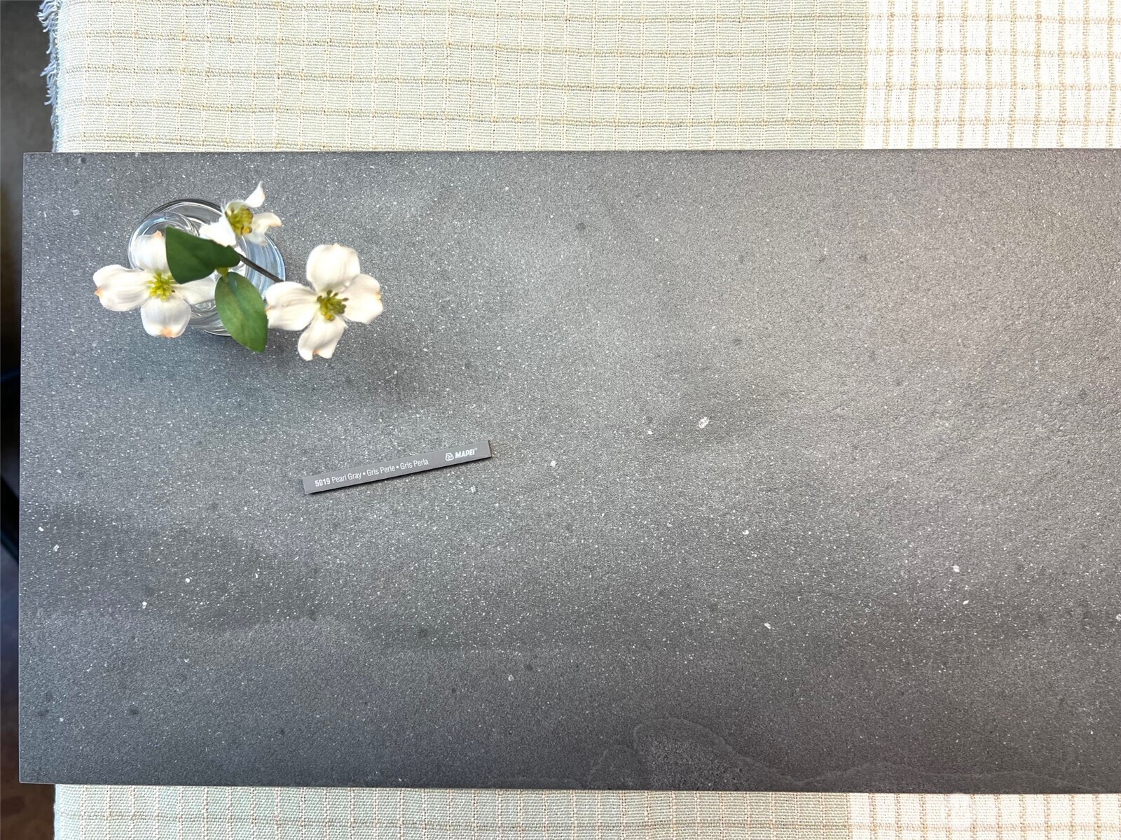 1323 Roland Street Bellingham, WA 98229 - Photo 8 of 8 a white vase with white and yellow flowers