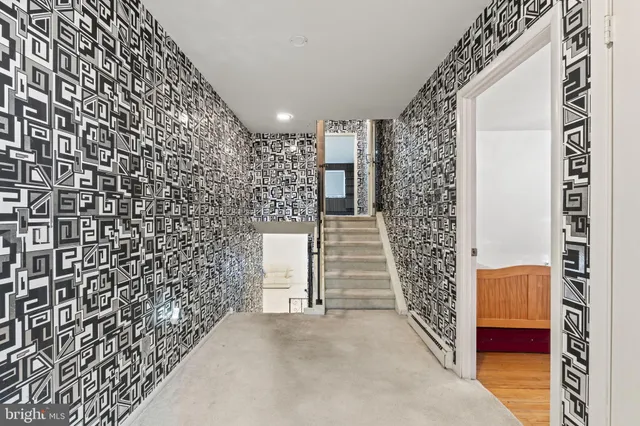 a view of entryway with stairs