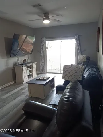 a bedroom with a bed and a dresser in it