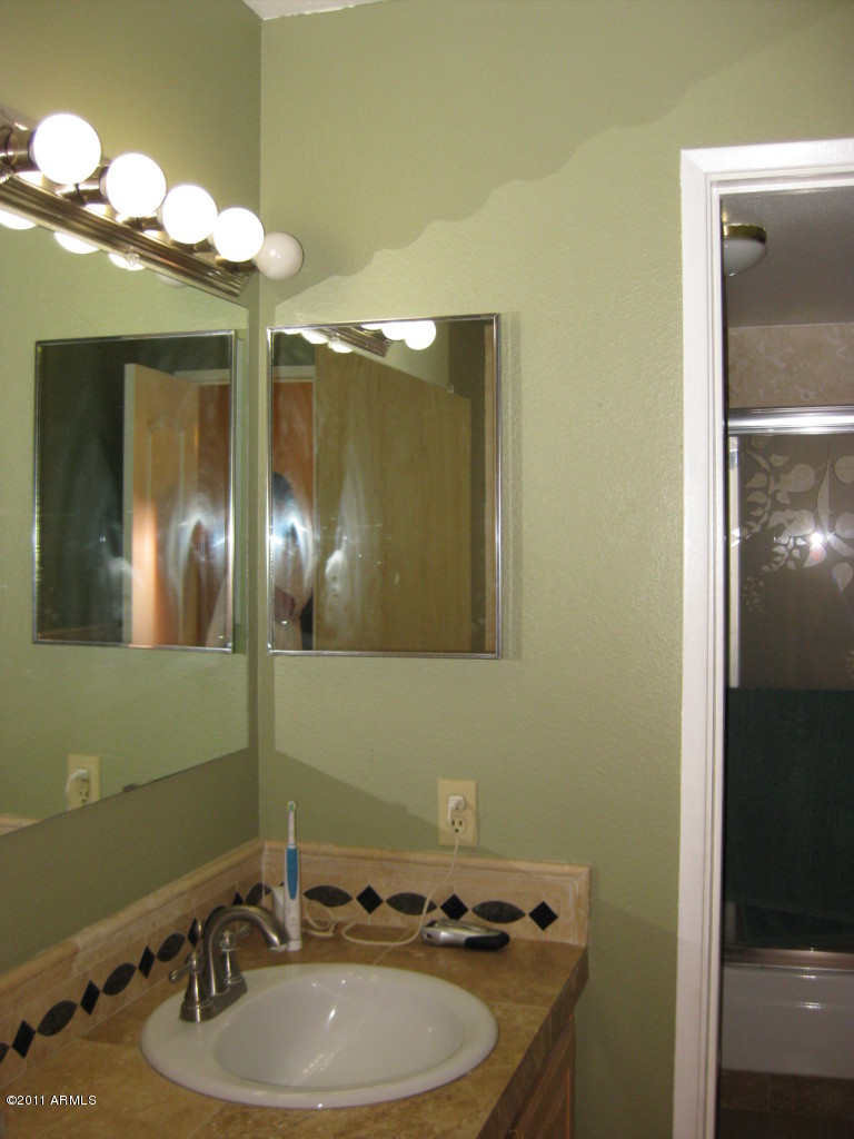 7625 East Camelback Road, Unit 418 Scottsdale, AZ 85251 - Photo 4 of 5 Updated bathrooms-double sink in master
