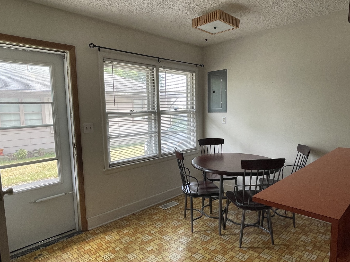 245 South Elm Street Herscher, IL 60941 - Photo 11 of 18 a workspace with furniture and a window